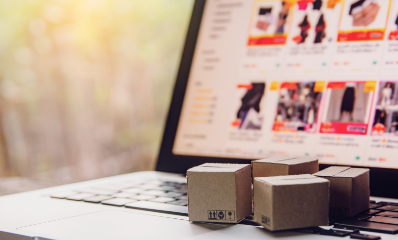 a laptop with miniature boxes