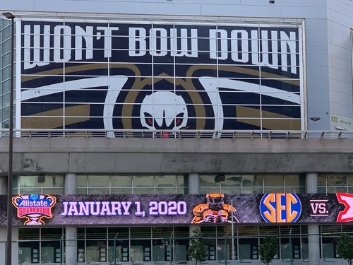 Installed NO Pelicans branding on windows on the side of the Smoothie King Center