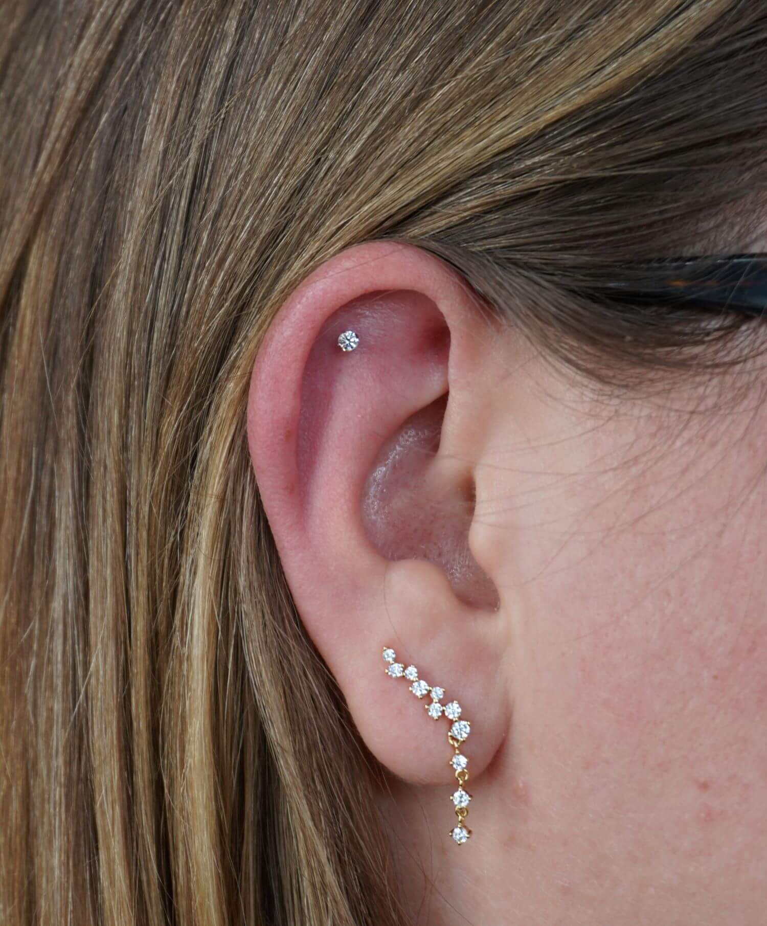 Ear piercing done by Barbie Santillan at Saints and Sinners Tattoo