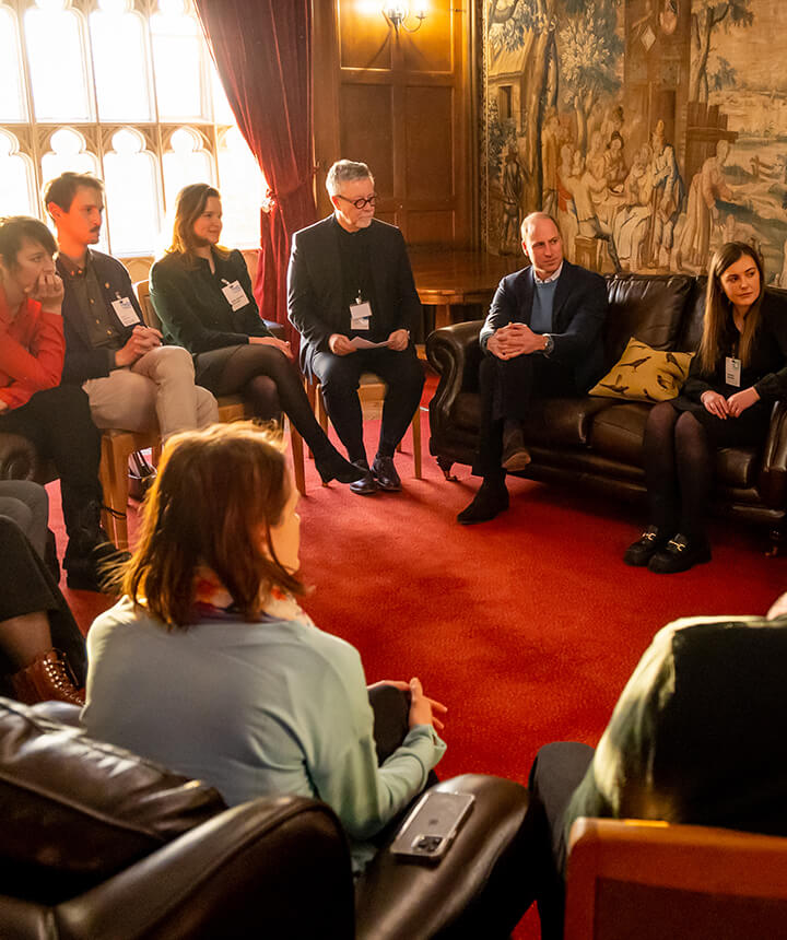 Prince William, Tim Brown and others listen as one of the finalists of the 2022 Earthshot Prize speaks.