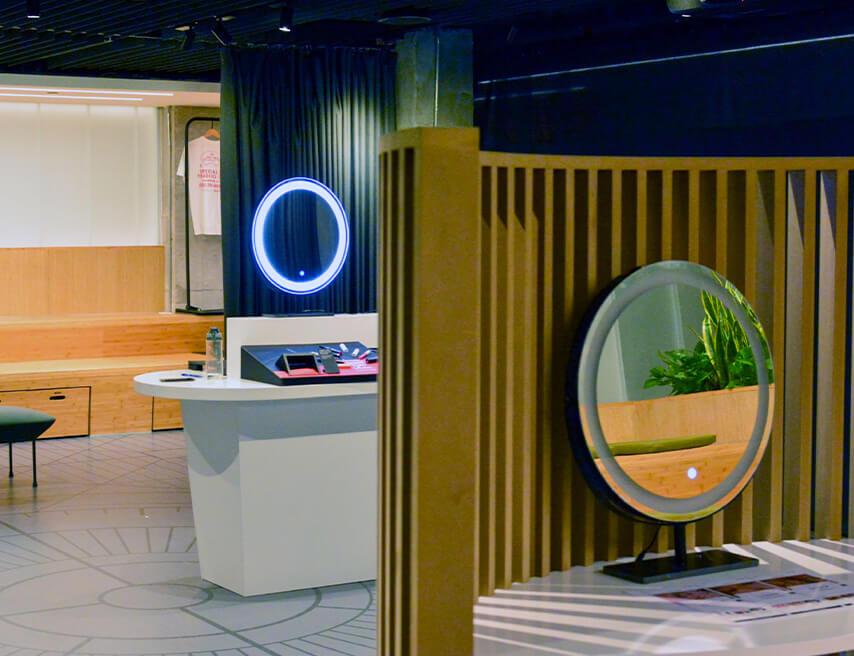 Round mirrors and bamboo slats make up the prototype for the concept store