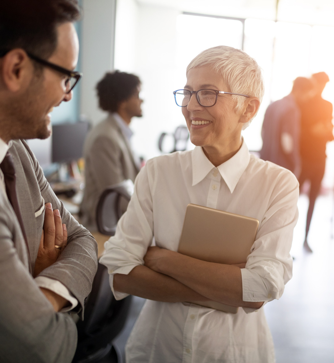 Old Lady Smiling While Holding a Book