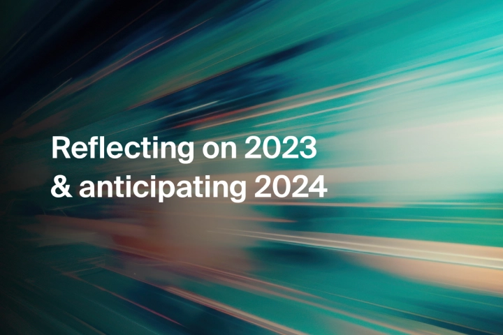 Abstract image with text "Reflecting on 2023 & anticipating 2024"