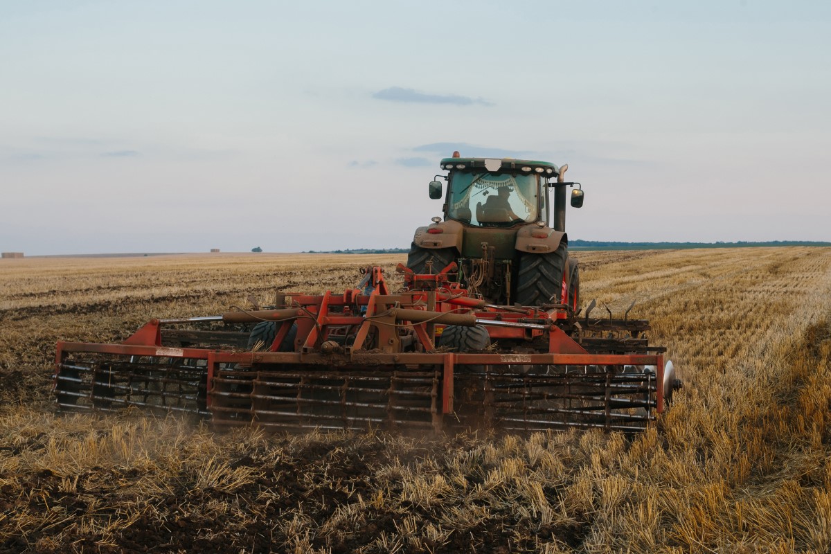 Image containing open air, sky, grass, farm machineAutomatically generated description