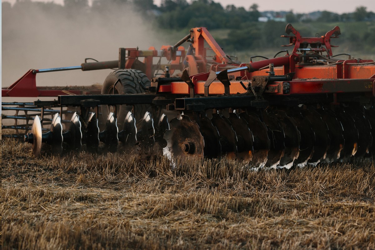 Image containing open air, grass, farm machine, skyAutomatically generated description