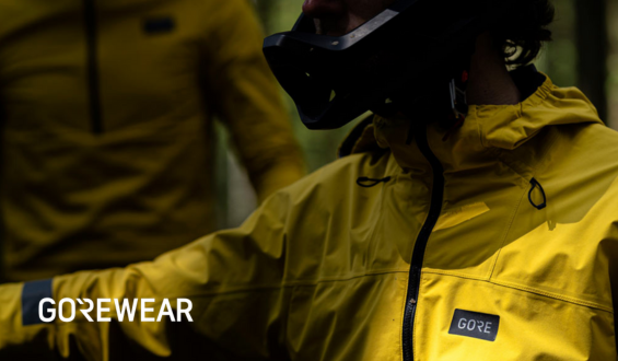 A cyclist wearing a jacket