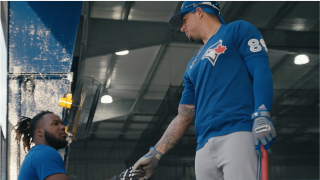 Screenshot of a whitebalance processed NBA clip of a player standing with a micset