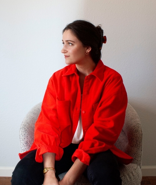 Portrait of Designer looking at main text