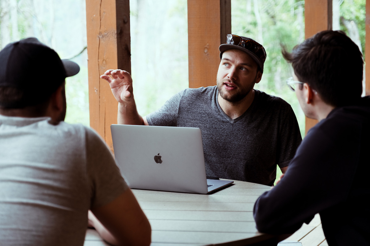 developer talking with team about project