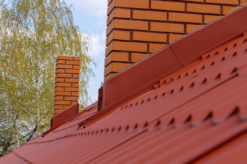 Comment démousser une toiture