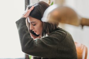 woman frustrated on phone