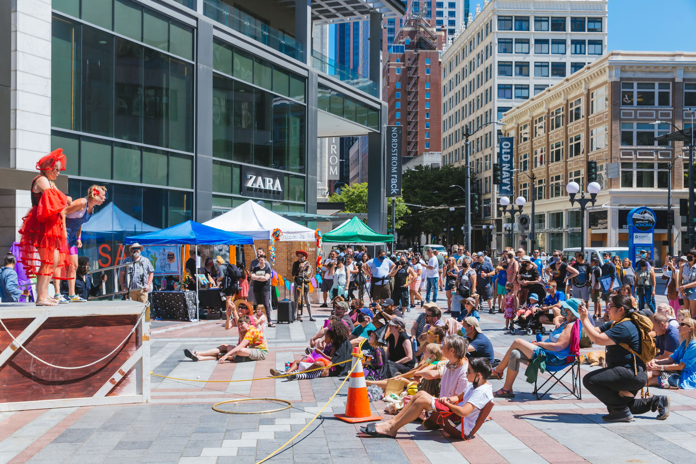 Group of people listening and watching a guest speaker