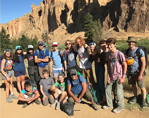 Group of young climbing campers and instructors standing together at Smith Rock State Park 