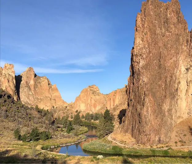 Large basalt columns and cliffs on a sunny day at Smith Rock State Park