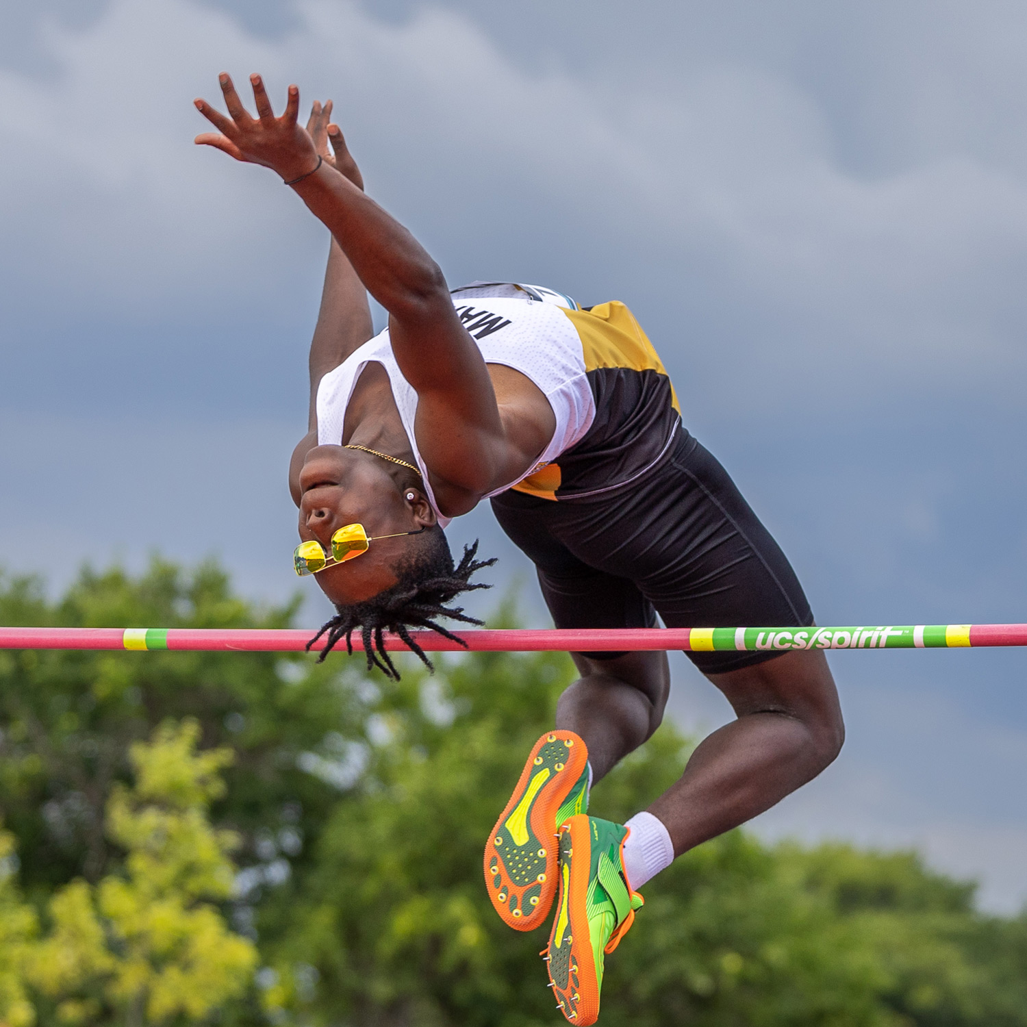 gold high top cleats