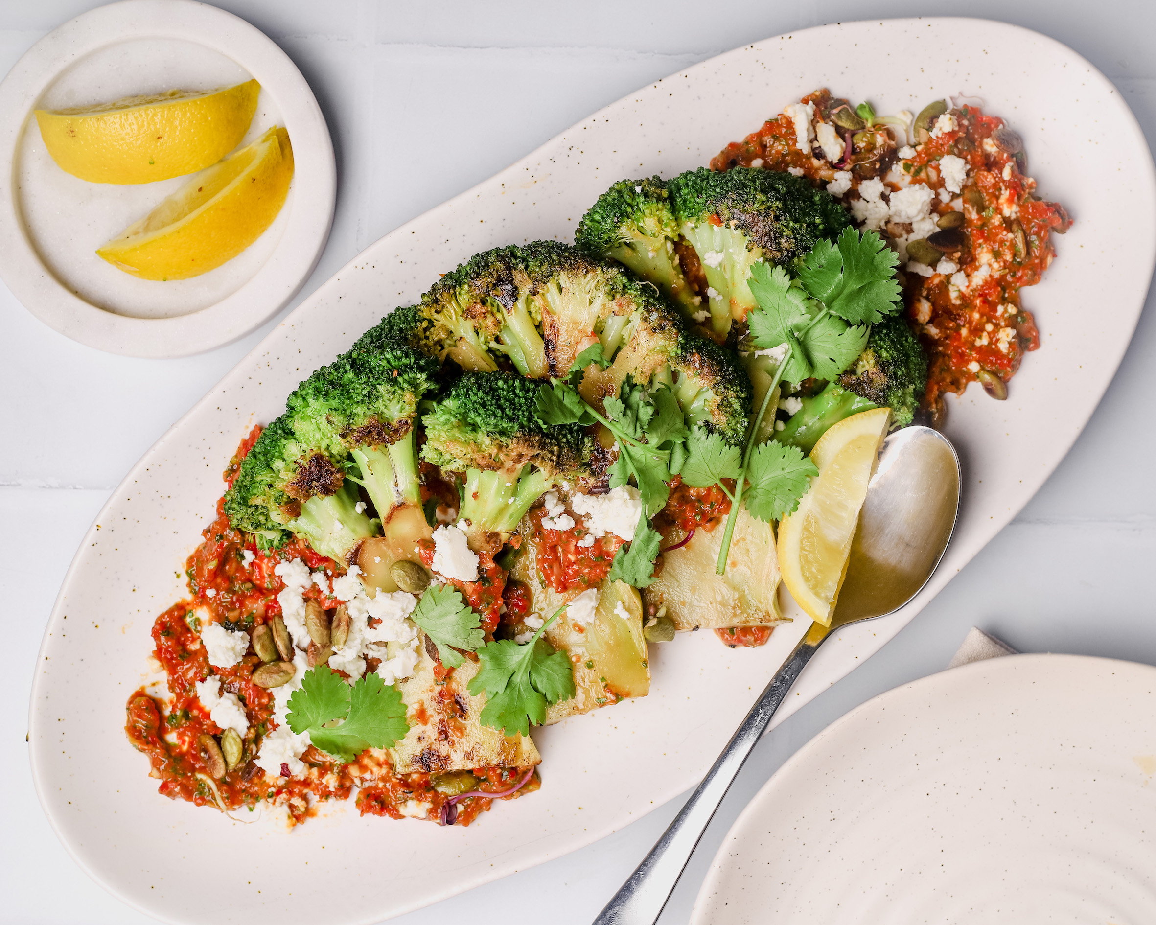 Charred Broccoli Steaks, Romesco Sauce, Feta & Toasted Pepitas