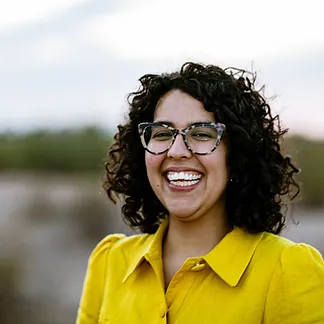 A headshot of Anita Huizar-Hernandez