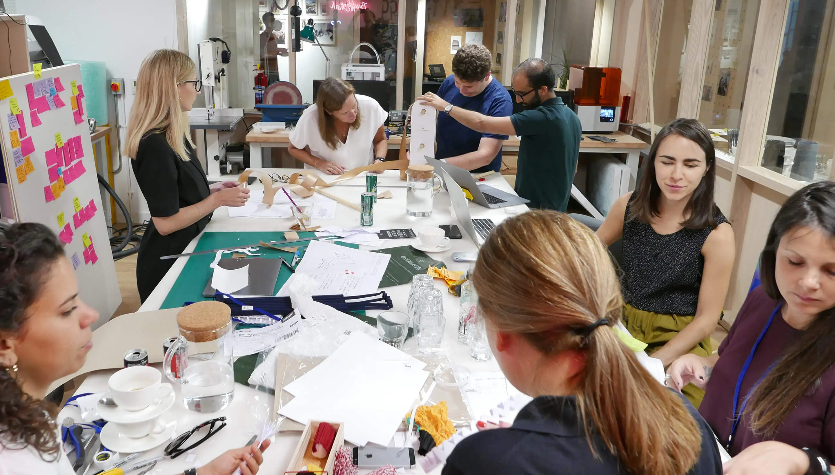 case study of h m H&M design team reviewing different packaging prototypes