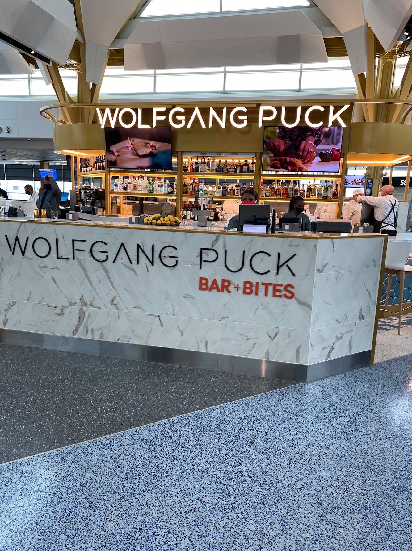 Wolfgang Puck Bar + Bites, Washington | ELM Surfaces | Porcelain ...
