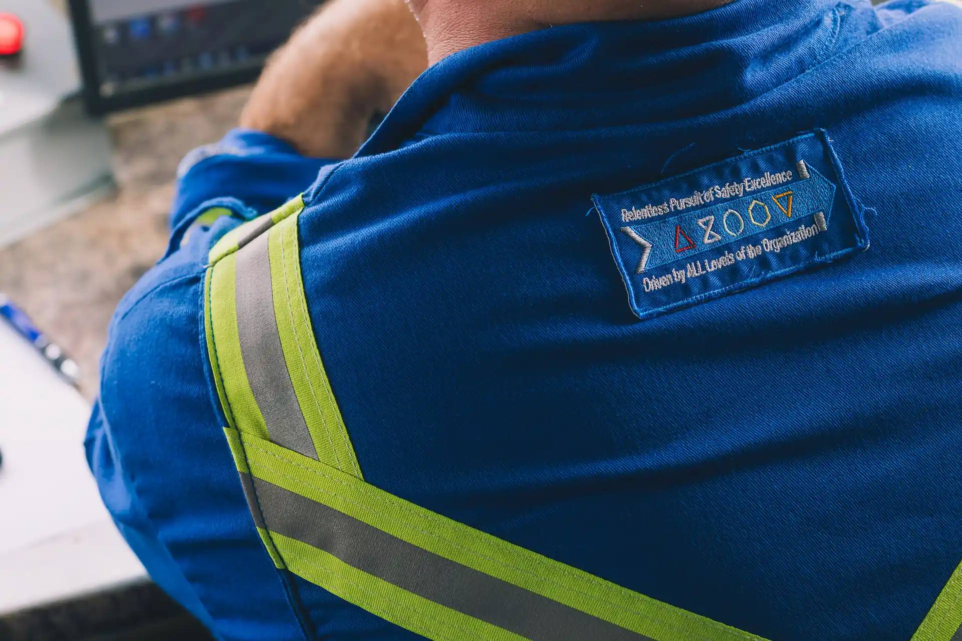 The back of a Source Energy Service employees vest