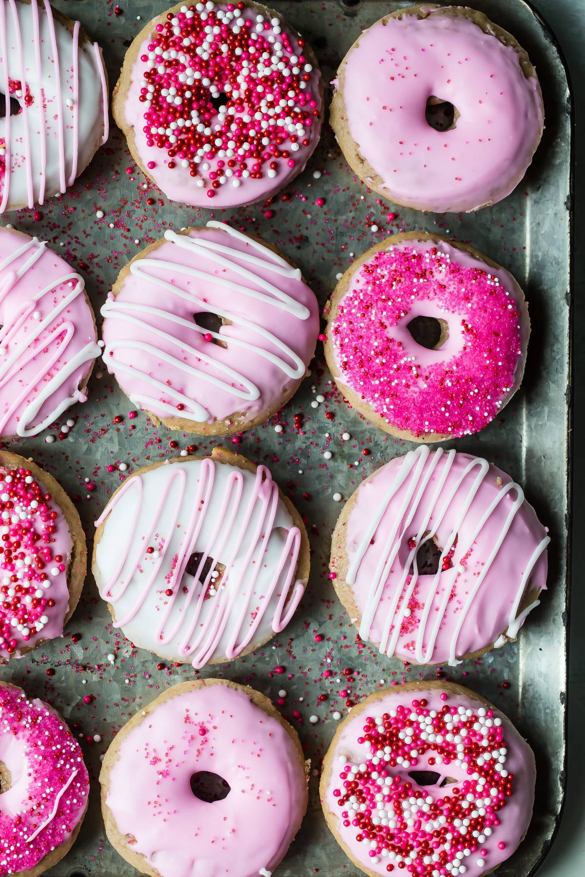 raspberry baked donuts ready to serve on a tray