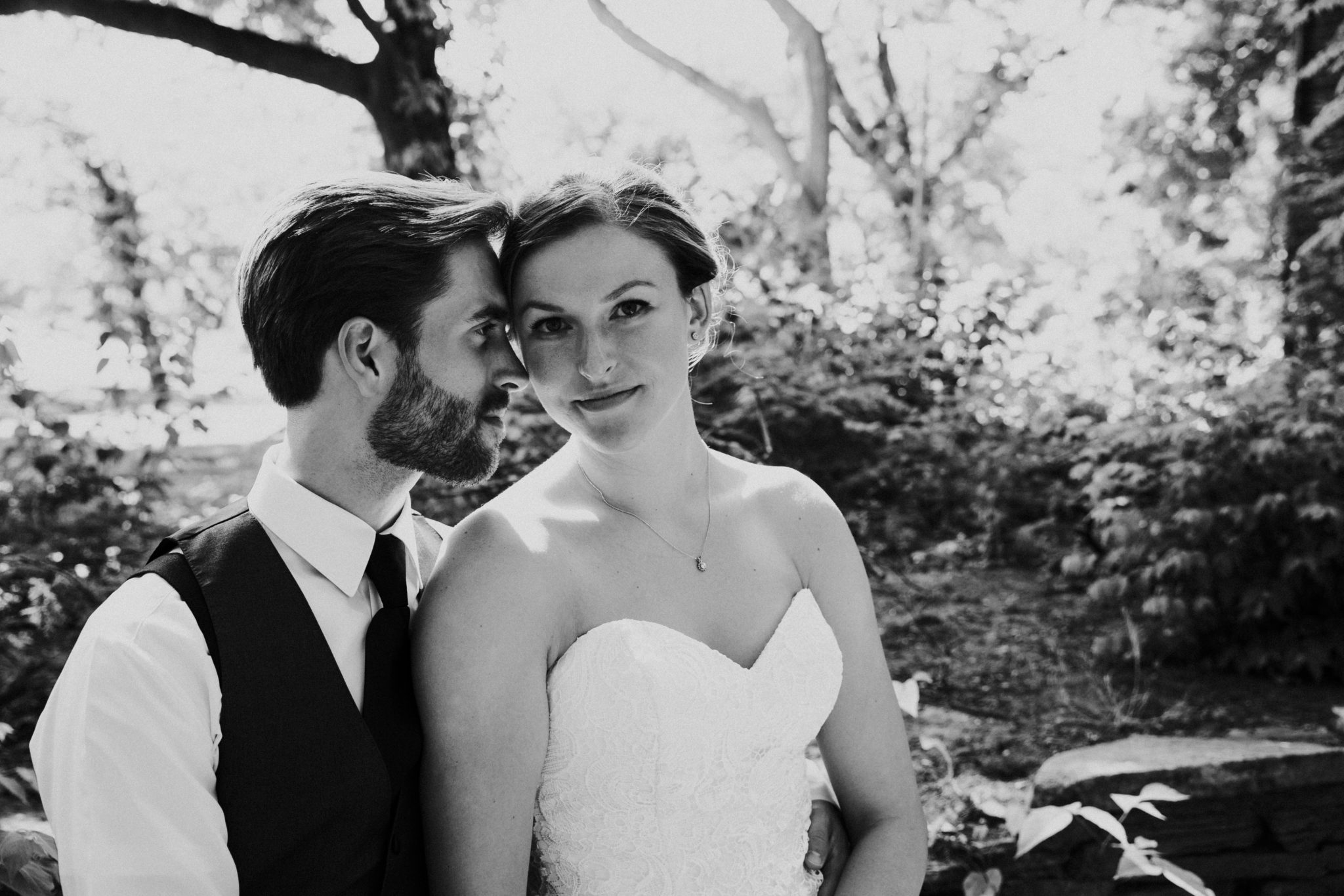 Black and white wedding photo of the author Mariah and her husband.