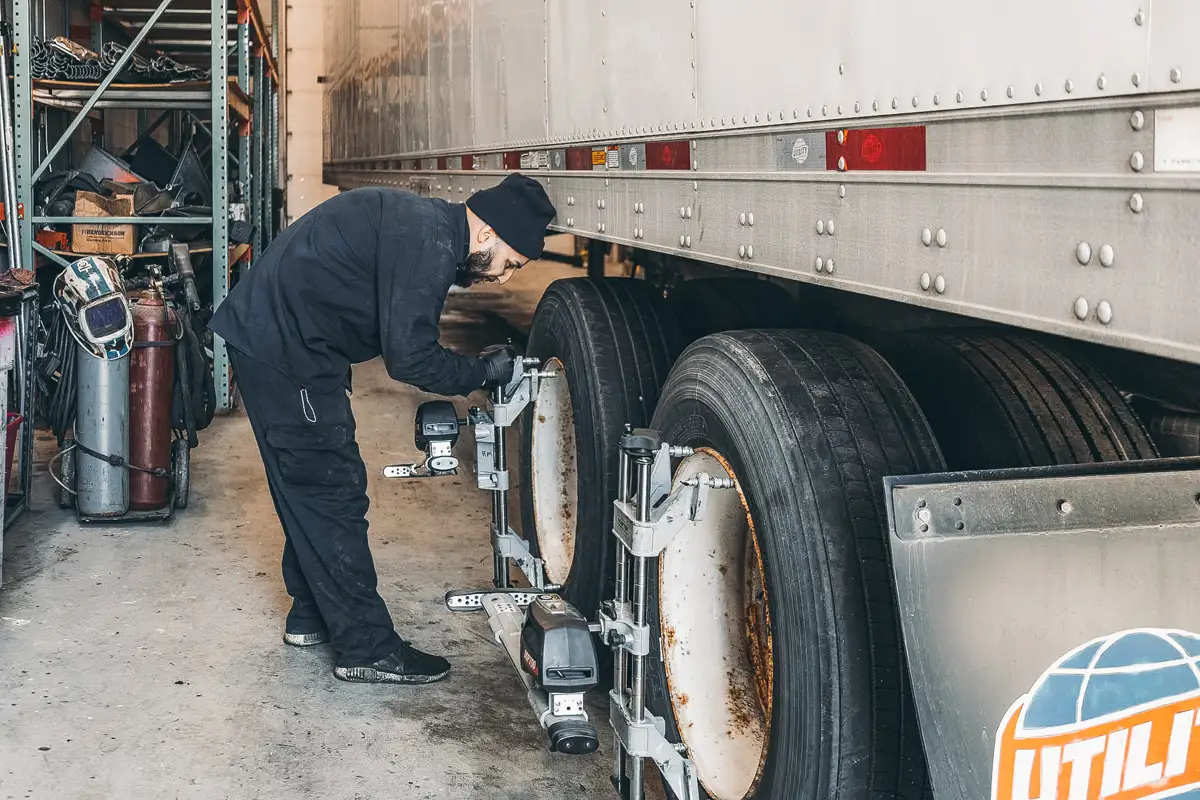 Mechanic performing truck tire repair in North Las Vegas, NV
