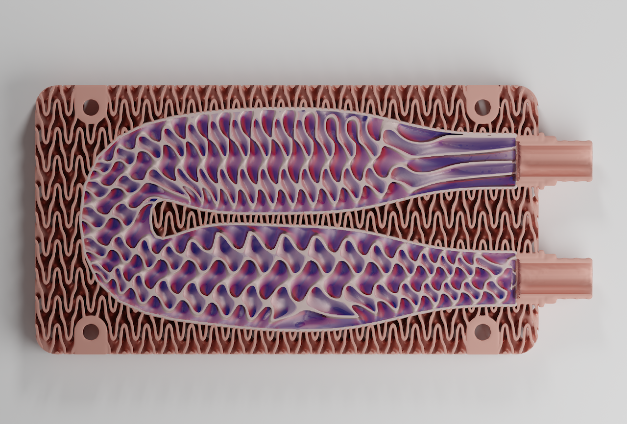 3D printed heat exchanger with complex internal lattice structures demonstrating the precision of additive manufacturing technologies.