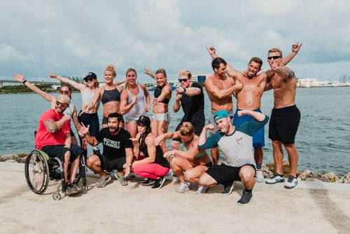 Group photo of Jessica Cahoy and other fitness individuals.