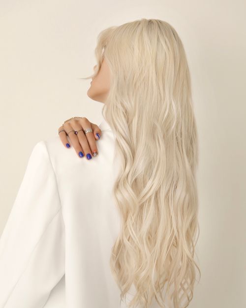 A model of Targol modelling and showcasing he new hairstyle.