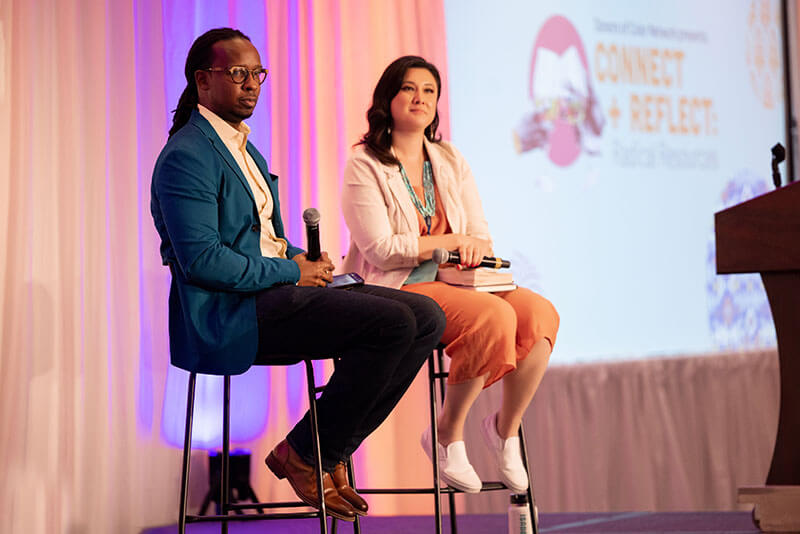 two speakers at the DOCN annual retreat discussing racial justice issues