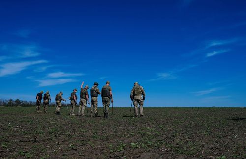 Mined fields; Ukrainian policemen looking for Butterfly-mines and de-mining fields in the Kharkiv province. May 17, 2023. Kharkiv Ukraine