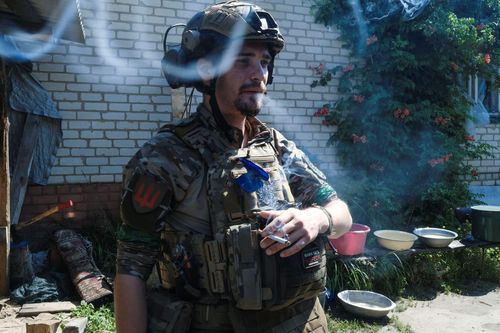 Lost in thoughts; Nikita (27), a medic with the 67th Mechanised Brigade, smoking a cigarette at his base near Yampil. July 5, 2023. Yampil Ukraine