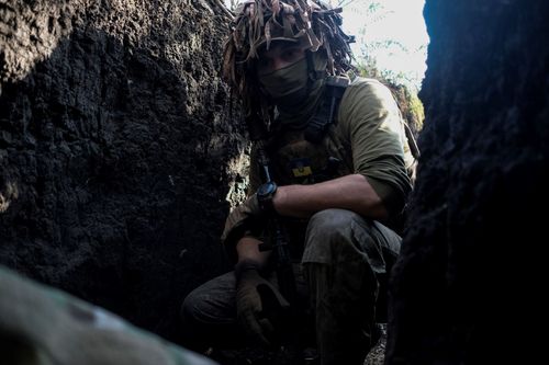 Until the music fades; Oleksey (39), a soldier with the 32nd Mechanised Brigade, hiding from drones and shelling near Kupyansk, 400 meters from the zero line. September 22, 2023. Kupyansk Ukraine