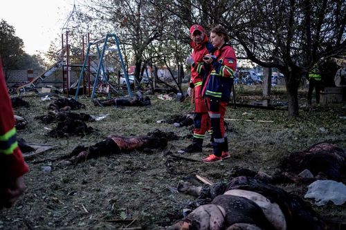 Collecting bodies; Emergency workers collecting and identifying bodies in Hroza. On 5 October 2023, a missile struck a café in the small village of Hroza in eastern Ukraine, killing 59 people attending a funeral reception. October 5, 2023. Hroza Ukraine
