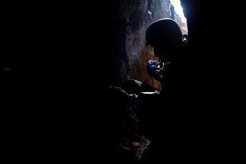 Smoking in bunker; Sitting in bunkers near Klishchiivka (south of Bakhmut), soldiers of CODE9.2 operate drones and drop 3D-printed self-made bombs in Russian trenches while providing intel for assault units. October 10, 2023. Klishchiivka Ukraine