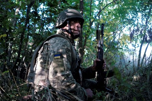 Hiding from drones; A soldier with the 32nd Mechanised Brigade hiding from drones and shelling near Kupyansk, 400 meters from the zero line. September 22, 2023. Kupyansk Ukraine