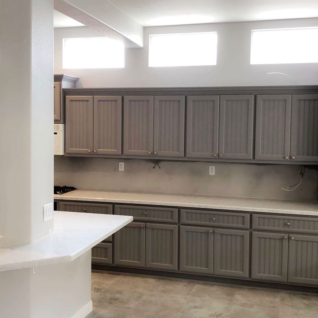 Quartz Kitchen Countertops with Custom Cabinets - Iron Hands Construction
