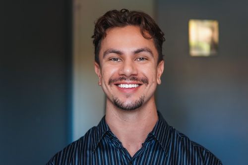 Portrait style headshot of a young male, mid 20's