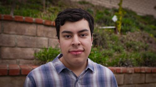 Portrait style headshot of a young male, early 20's
