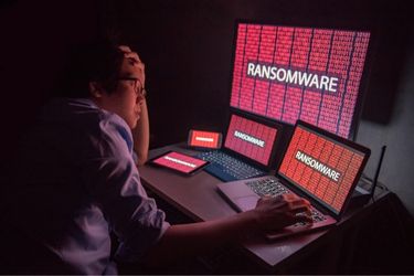 Person being hacked with ransomware