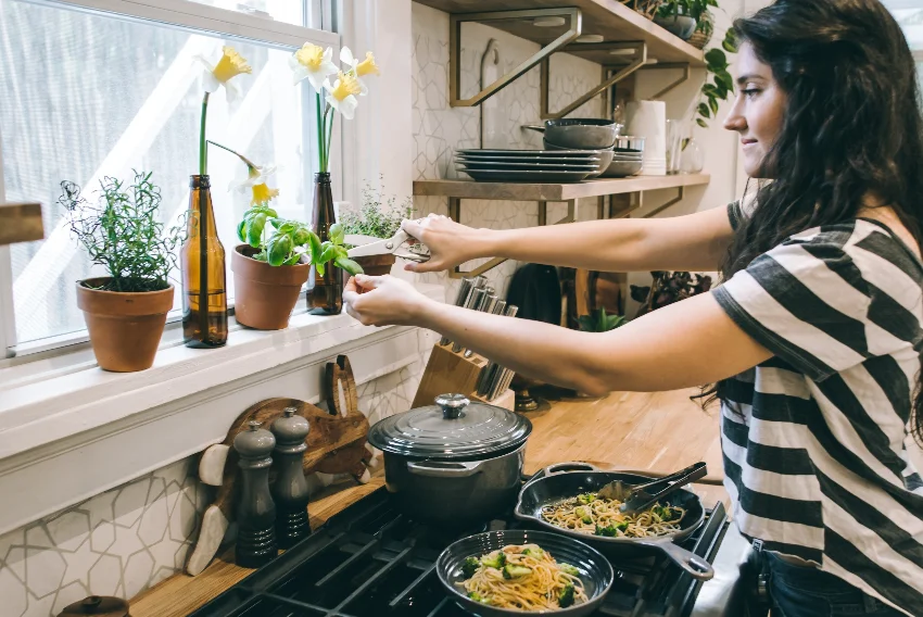 A person in a kitchen.