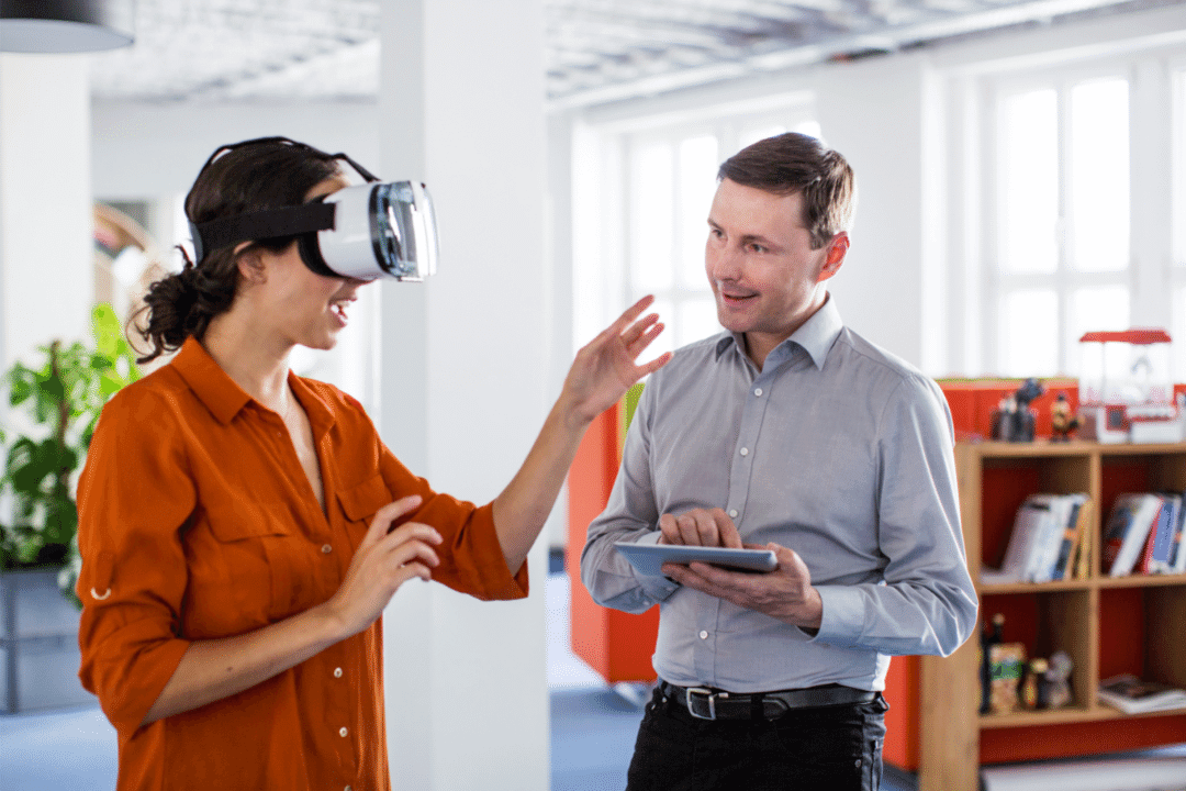 employees testing new virtual reality program in the office