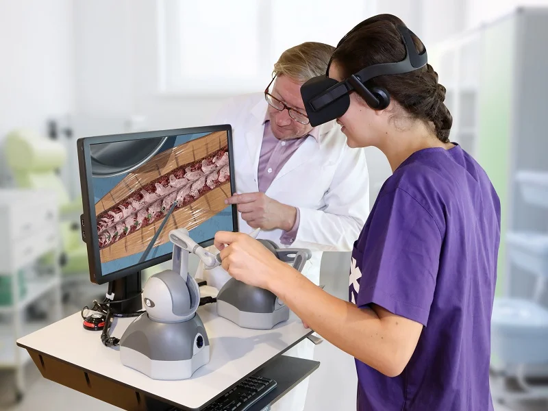 A trainee surgeon learns a spinal procedure using a virtual reality simulation
