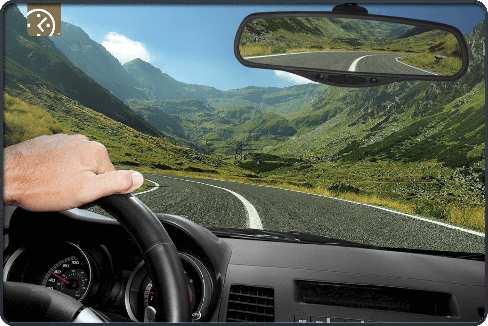Driver driving car on a mountain road