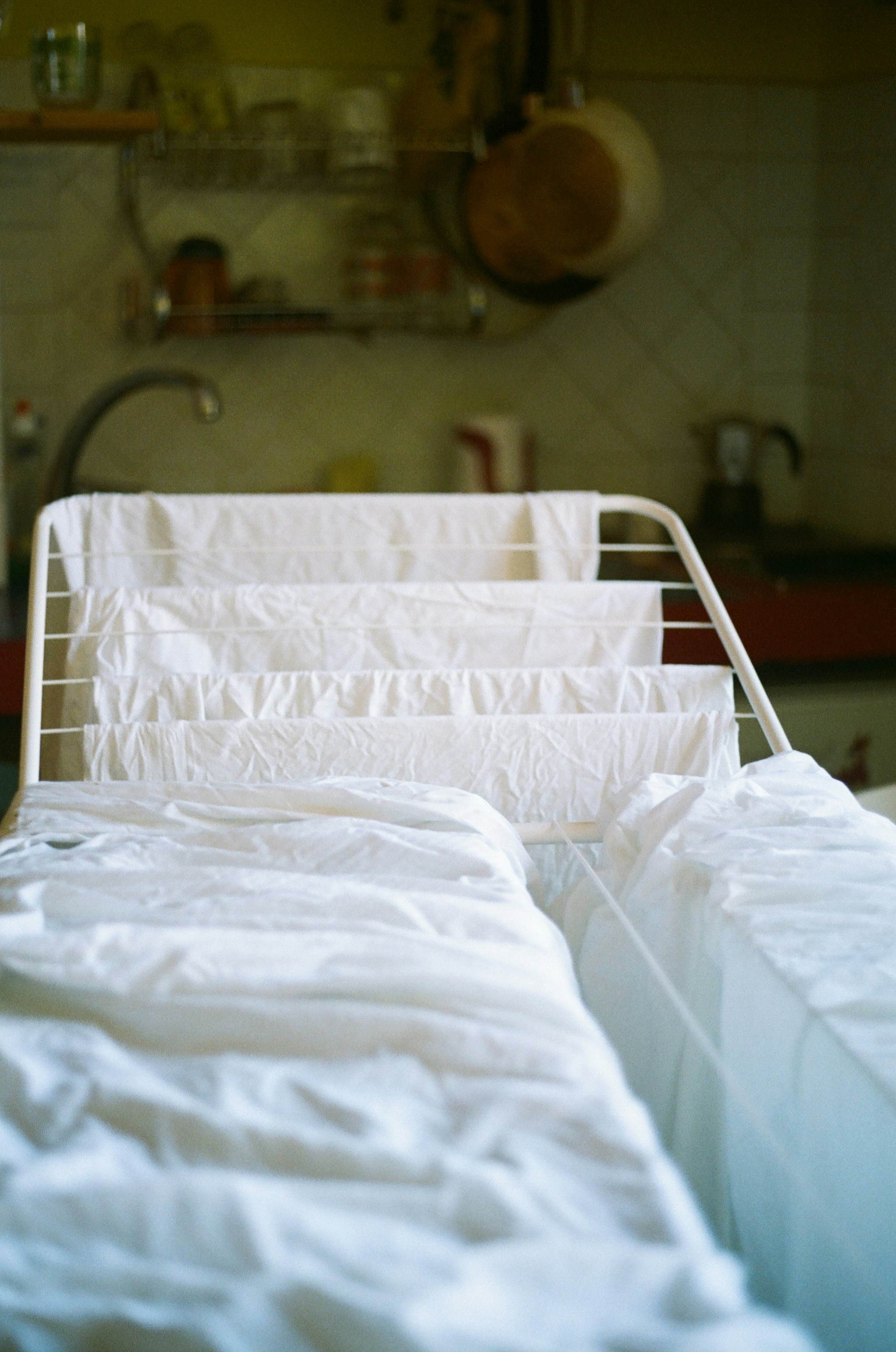 drying rack with white laundry