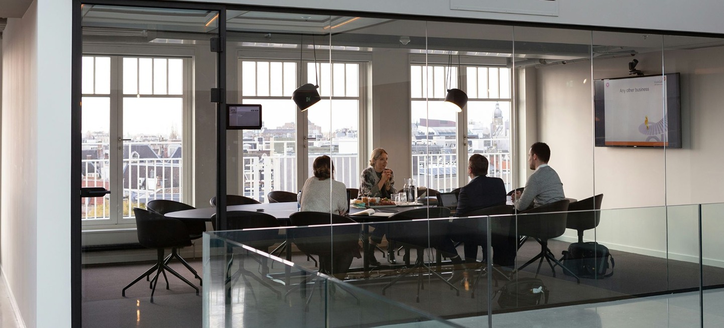group of business people meeting in modern conference room
