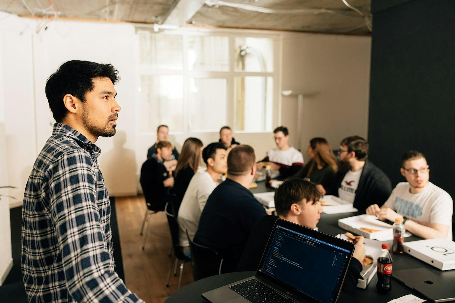 Team members of novu in a meeting