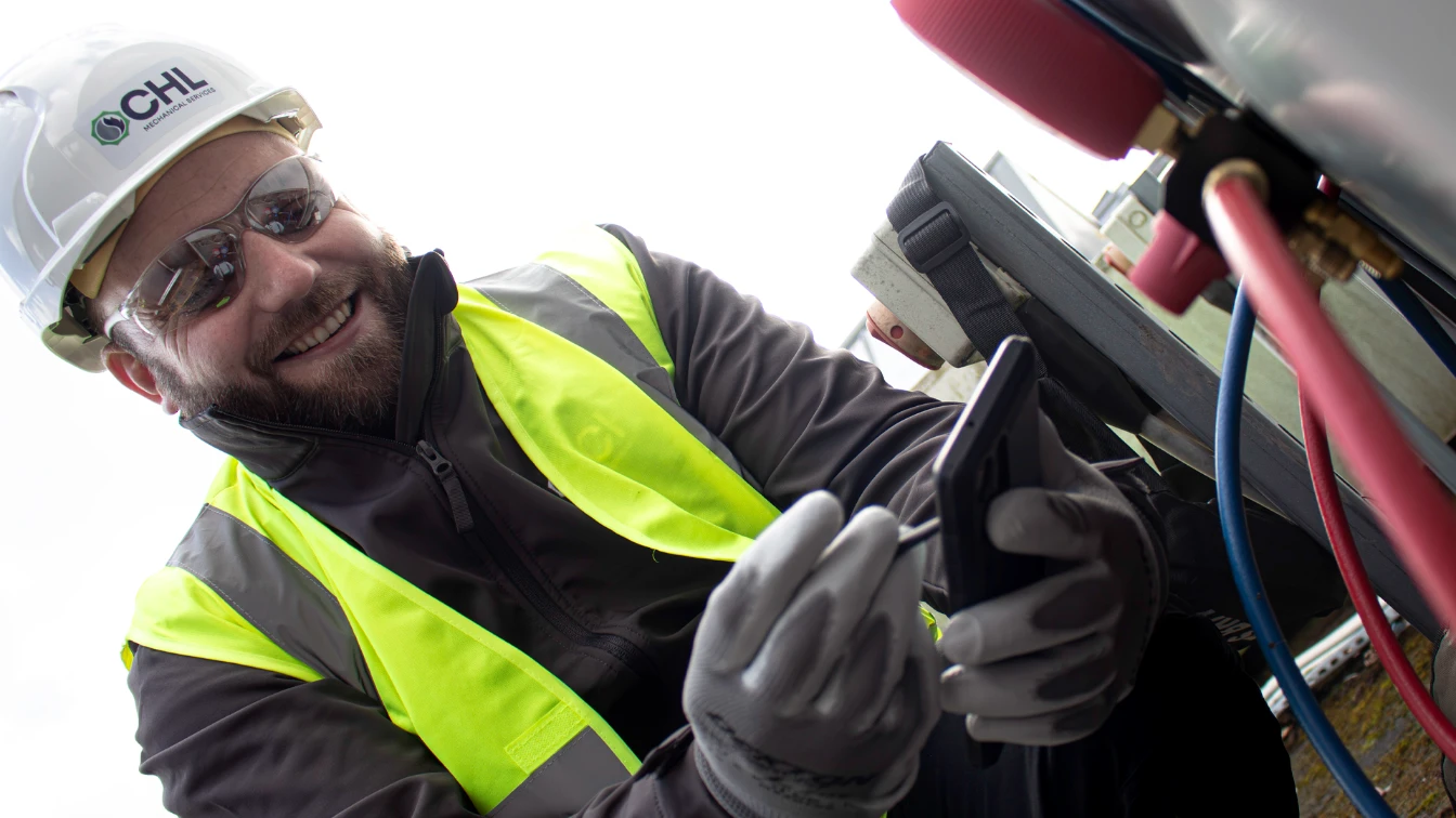 An CHL employee conducting a gas safety check