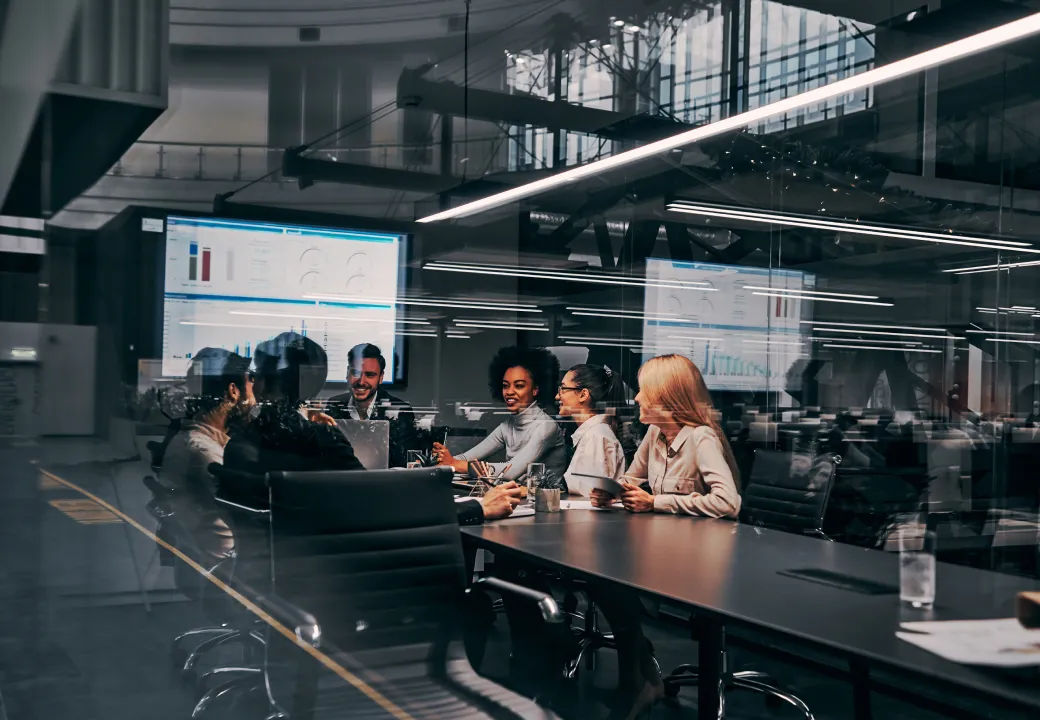 Conference room and people smiling